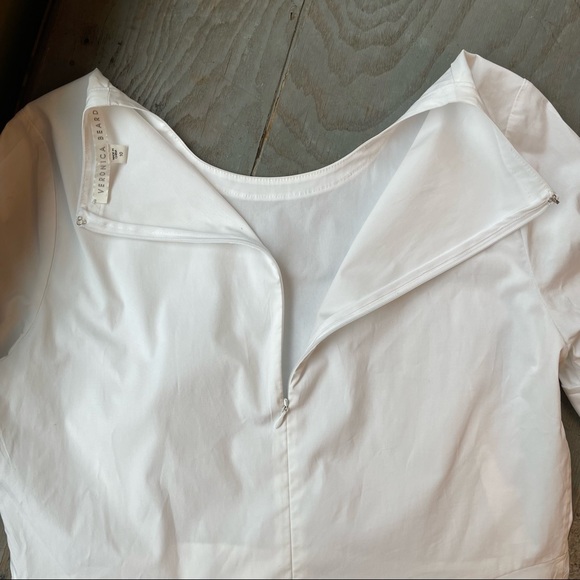 Veronica Beard short sleeve stretch poplin peplum shirt | size 10 - Picture 9 of 10